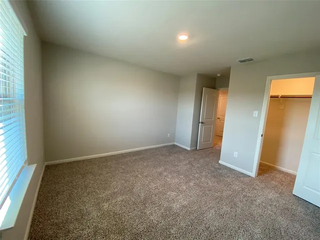 an empty room with a natural light