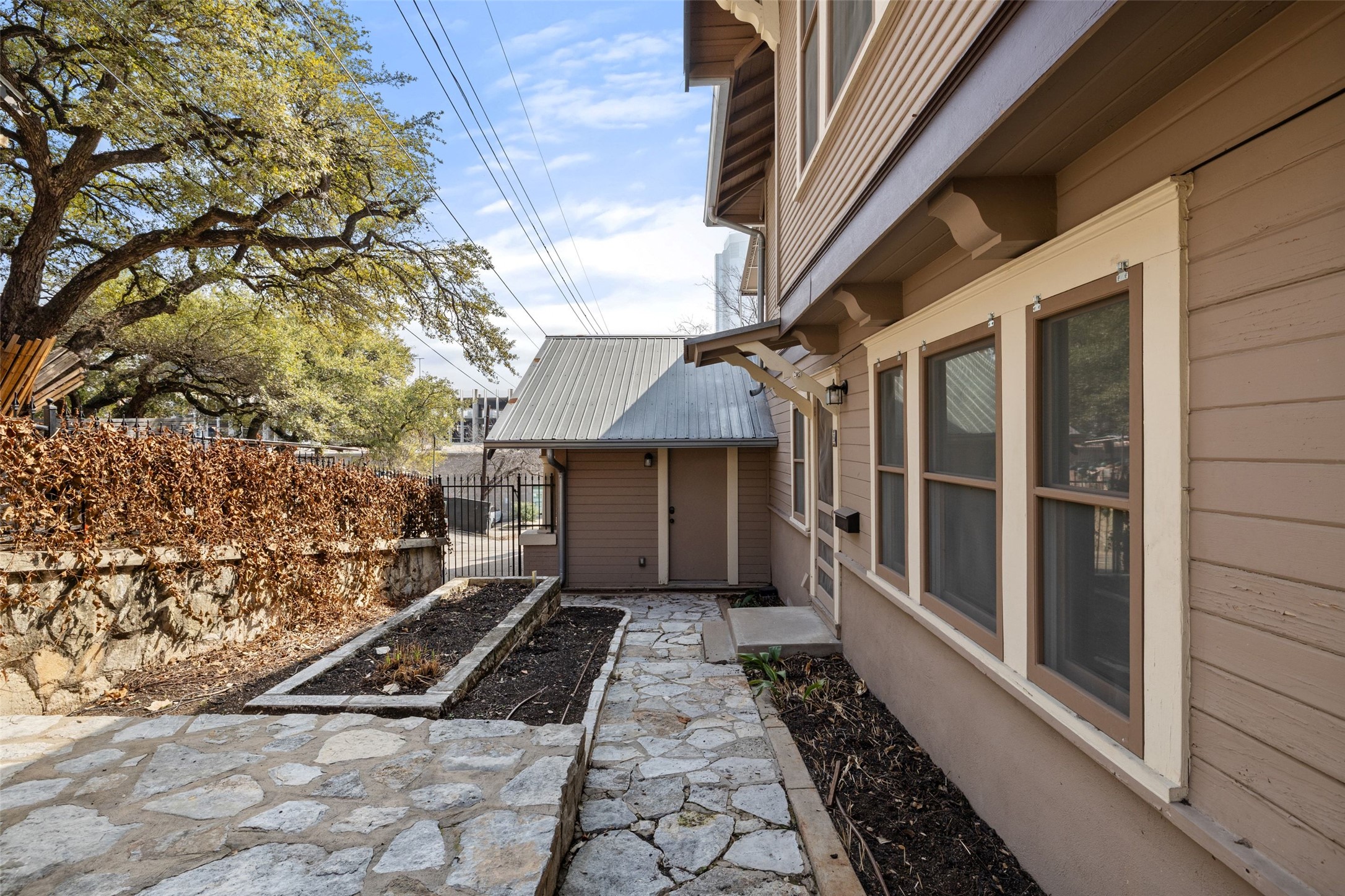 613 Baylor Street Austin, TX 78703 - Photo 34 of 40 a porch with view of the house