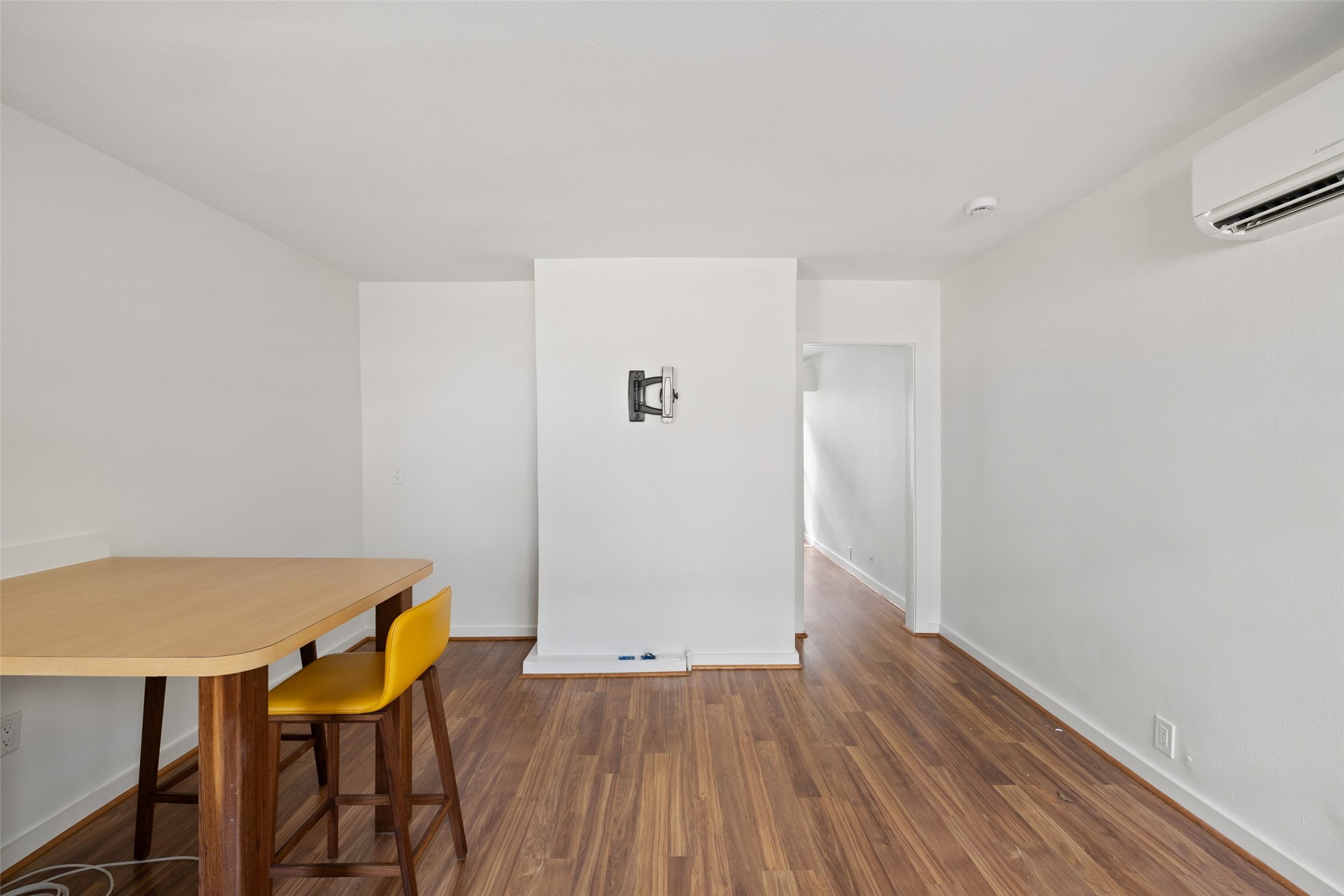 613 Baylor Street Austin, TX 78703 - Photo 37 of 40 a view of a room with wooden floor and dining room