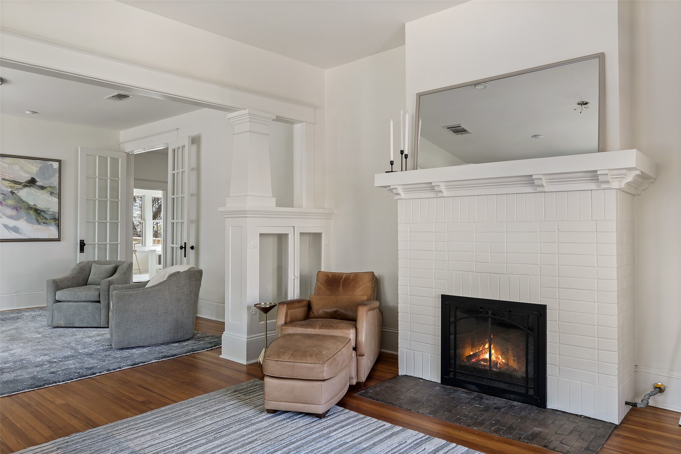 613 Baylor Street Austin, TX 78703 - Photo 6 of 40 a living room with furniture and a fireplace
