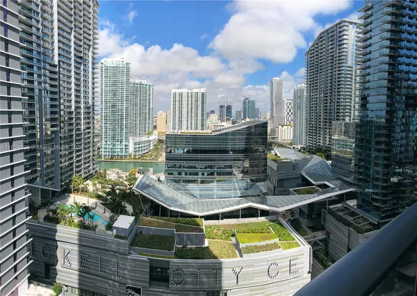 a view of swimming pool with outdoor seating
