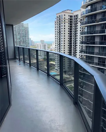 a view of balcony with furniture