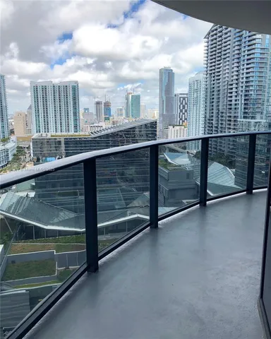a view of a balcony with an outdoor space