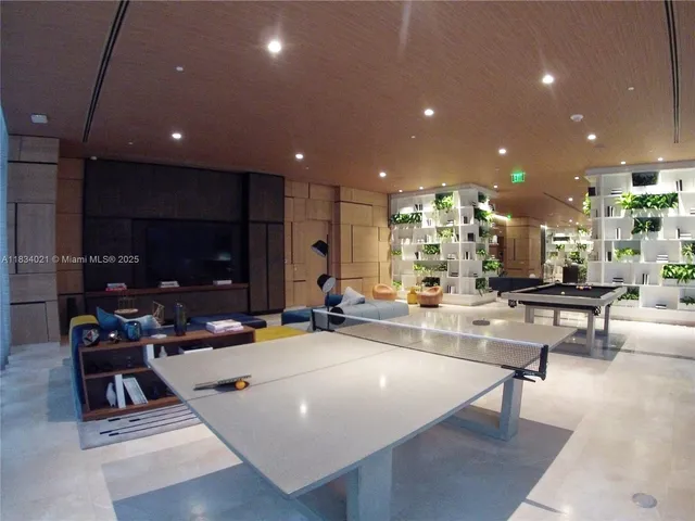 a view of a lobby with gym equipment