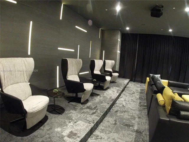 a kitchen with a table and chairs