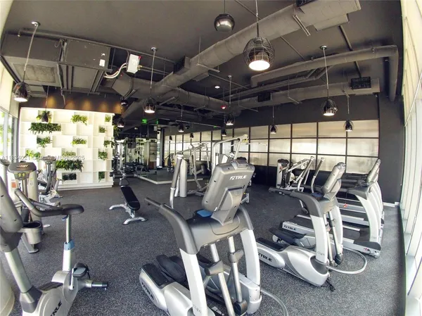 a view of a room with gym equipment