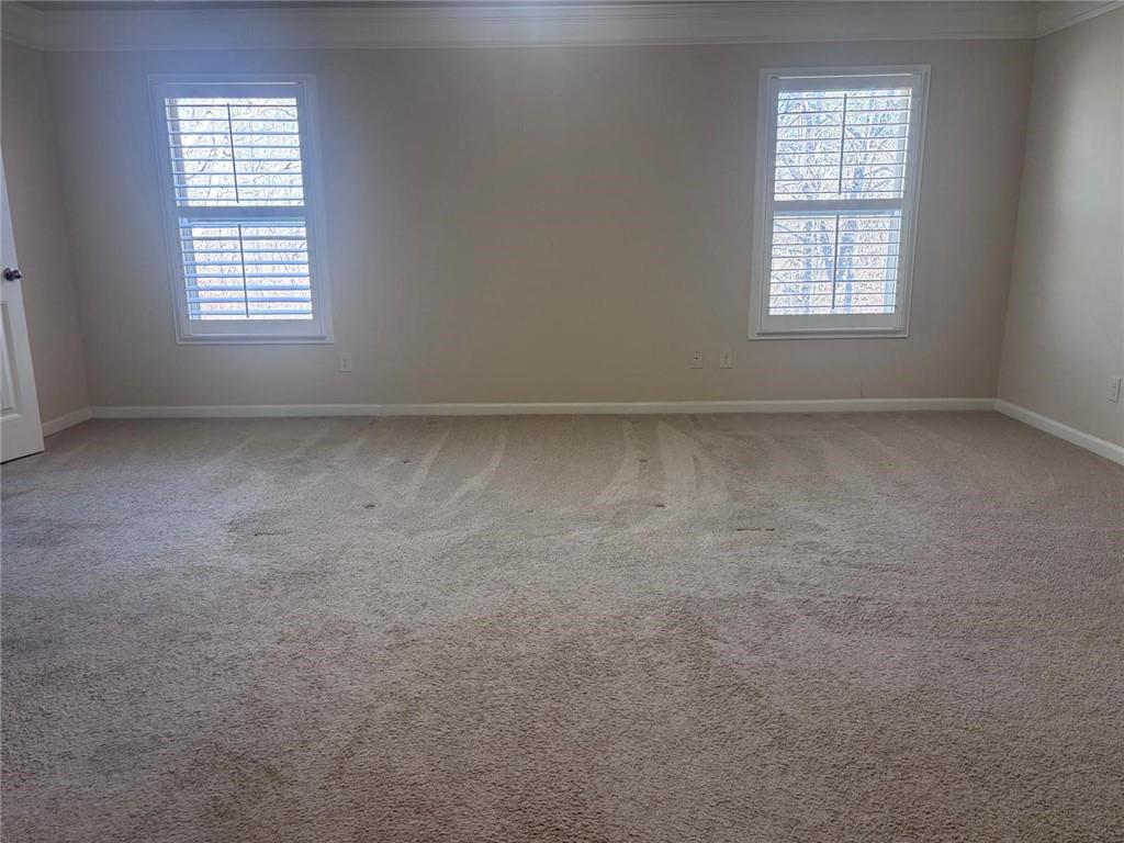 1615 Beckham Street Cumming, GA 30041 - Photo 14 of 33 an empty room with a window