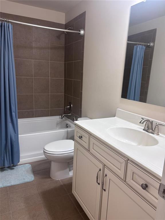 1615 Beckham Street Cumming, GA 30041 - Photo 15 of 33 a bathroom with a sink a toilet and shower