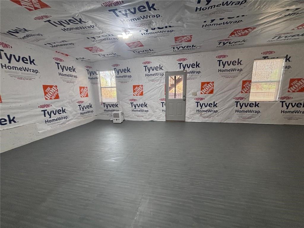 1615 Beckham Street Cumming, GA 30041 - Photo 30 of 33 a utility room with lots of storage and utility