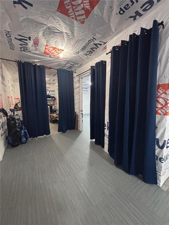1615 Beckham Street Cumming, GA 30041 - Photo 32 of 33 a view of a hallway with closet and wooden floor