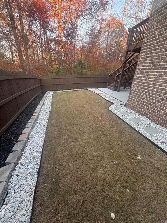 1615 Beckham Street Cumming, GA 30041 - Photo 4 of 33 a view of balcony with wooden floor