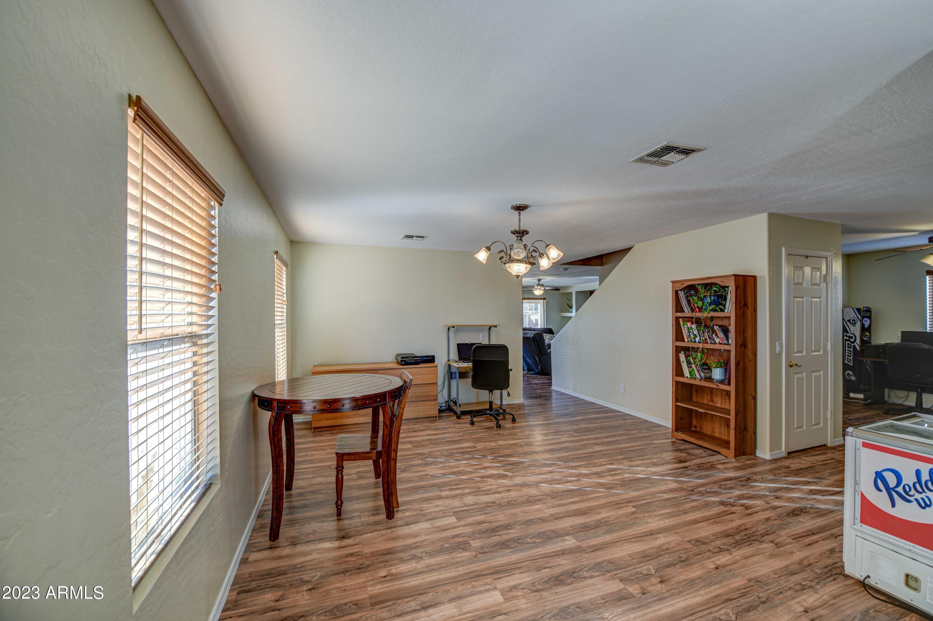 2311 West Tanner Ranch Road Queen Creek, AZ 85144 - Photo 4 of 35 Living Room 3