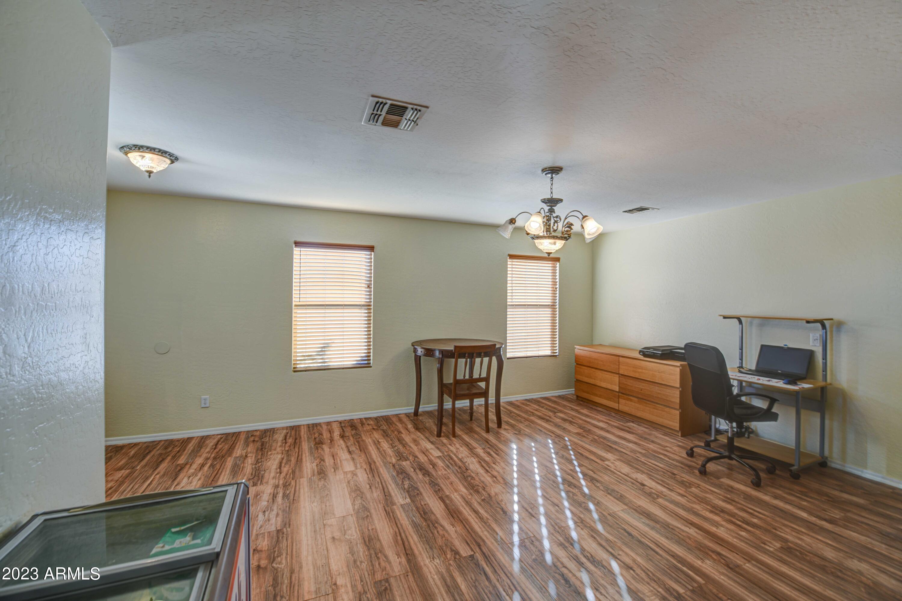 2311 West Tanner Ranch Road Queen Creek, AZ 85144 - Photo 5 of 35 Living Room 2