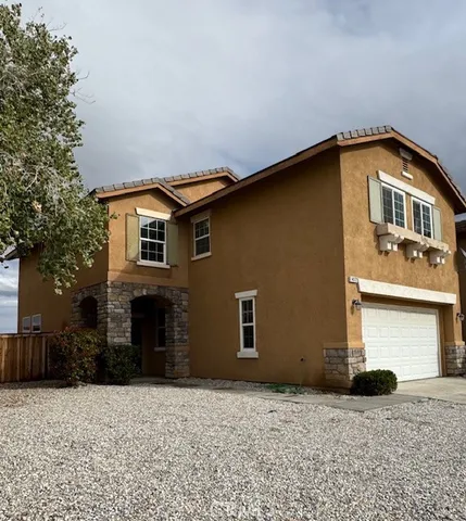 a front view of house with yard