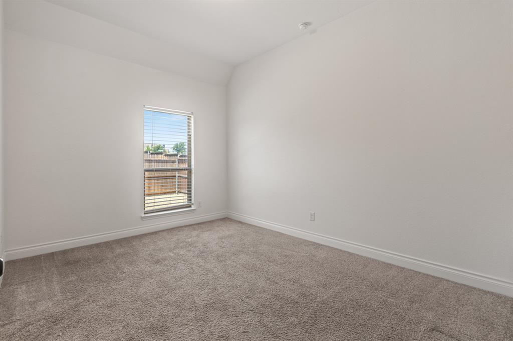 960 Knoxbridge Road Forney, TX 75126 - Photo 11 of 22 Carpeted room featuring a single window with horizontal blinds, neutral wall paint, and white baseboards