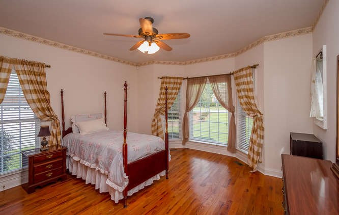 208 Steeple Ridge Road Aiken, SC 29803 - Photo 11 of 42 Extra main floor bedroom with hardwood
