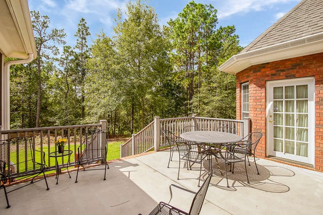 208 Steeple Ridge Road Aiken, SC 29803 - Photo 8 of 42 Concrete Porch connects the home spaces