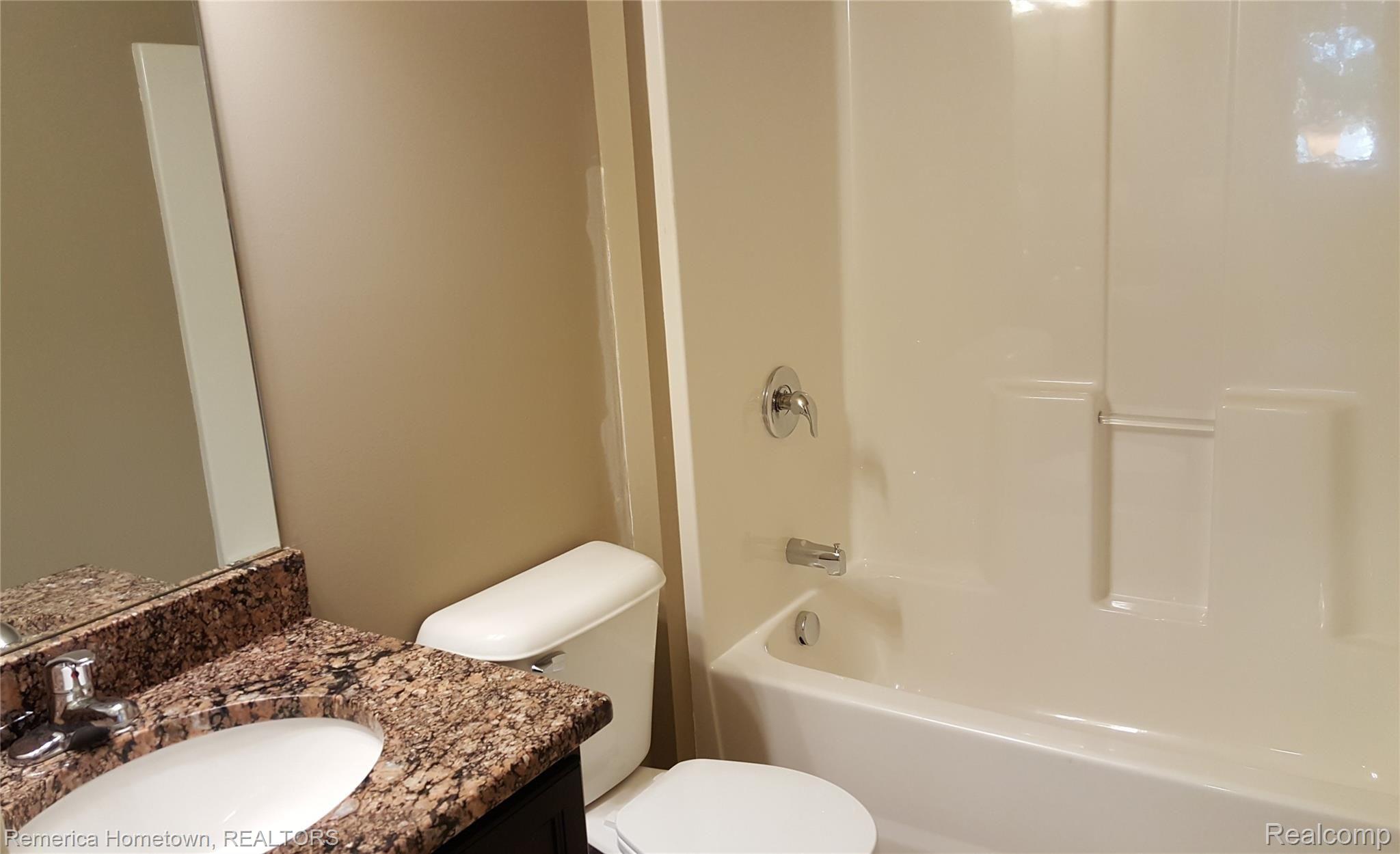 19315 Inkster Road Livonia, MI 48152 - Photo 13 of 15 7.1 Hall Bath