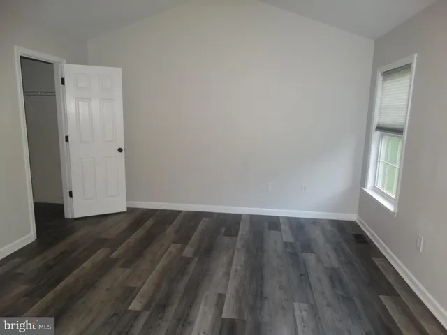 a view of an empty walk in closet