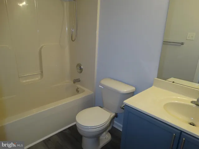 a view of a bathroom from the hallway