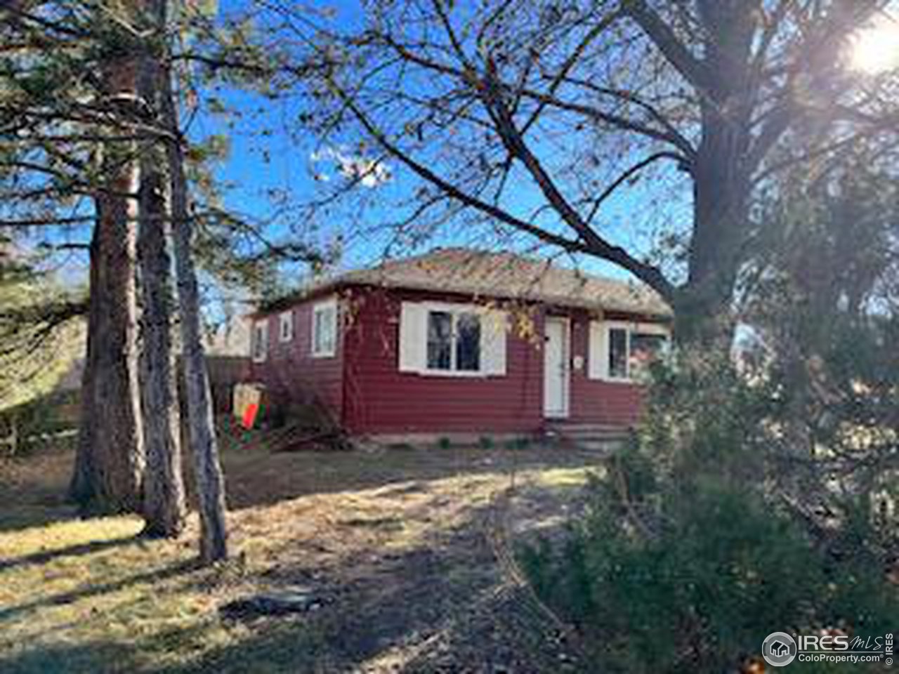 300 27th Street Boulder, CO 80305 - Photo 13 of 21 a view of a house with a yard tree and a fire pit