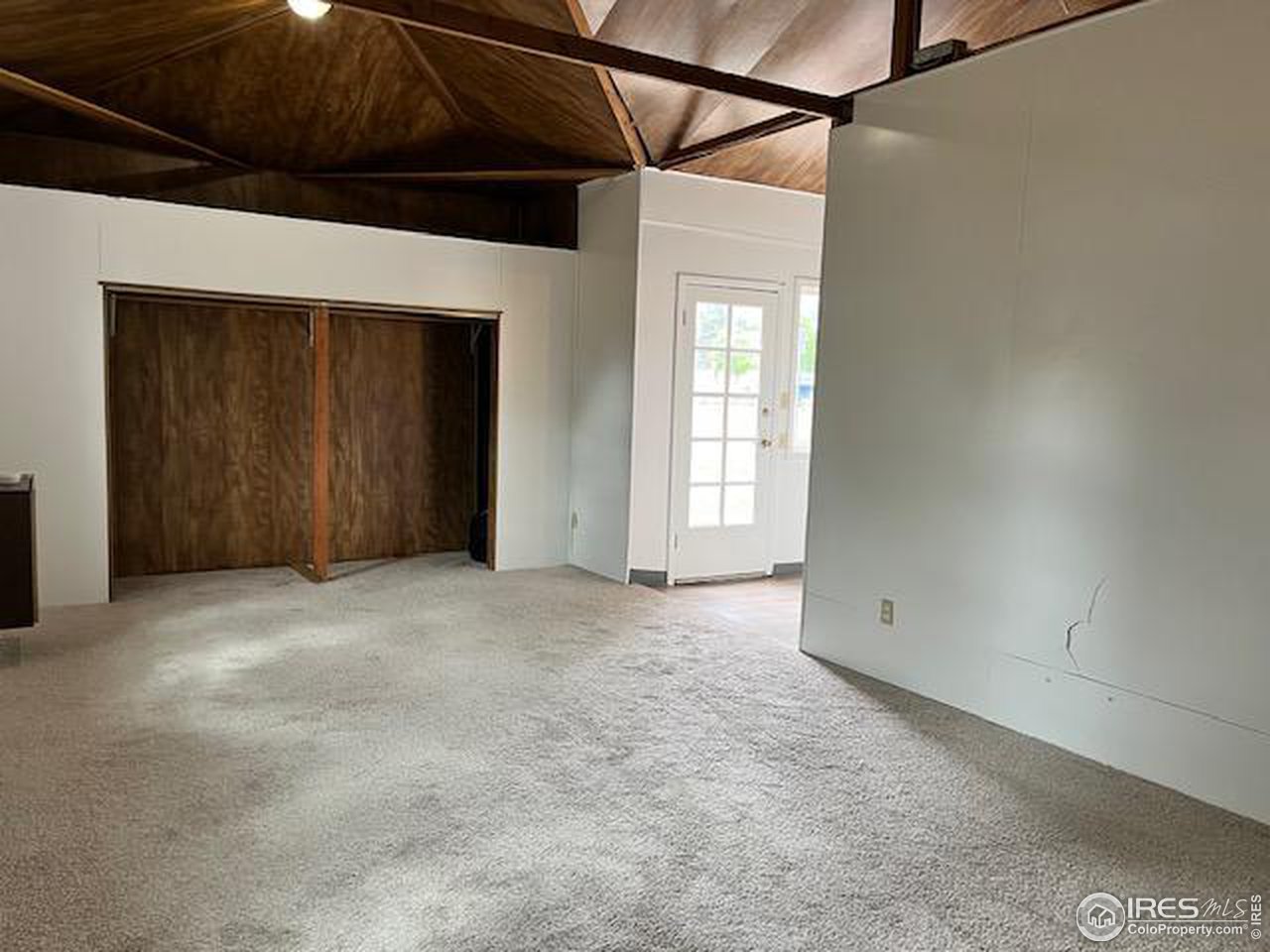 300 27th Street Boulder, CO 80305 - Photo 18 of 21 a view of an empty room with a window