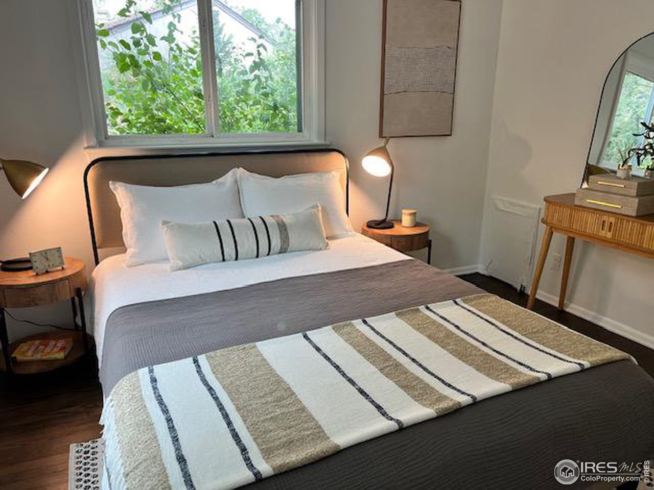 300 27th Street Boulder, CO 80305 - Photo 7 of 21 a bedroom with a bed and a window