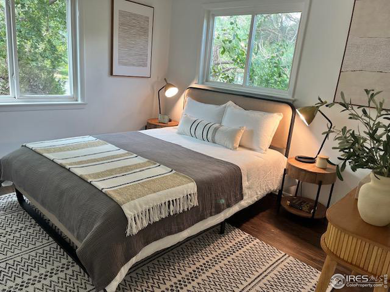 300 27th Street Boulder, CO 80305 - Photo 8 of 21 a bedroom with a bed and a window
