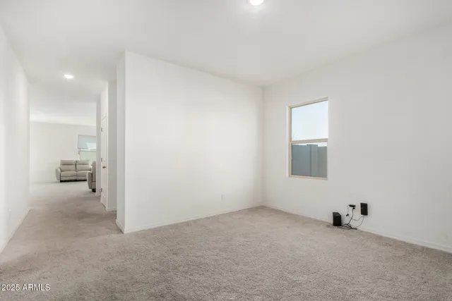 a picture of a bench in front of a window