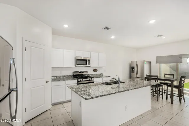 a living room with furniture and a couch
