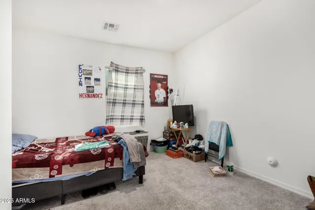 a kitchen with stainless steel appliances granite countertop a refrigerator stove microwave and sink