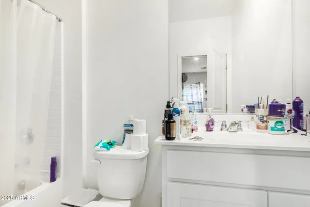 a kitchen with stainless steel appliances granite countertop a sink refrigerator and microwave