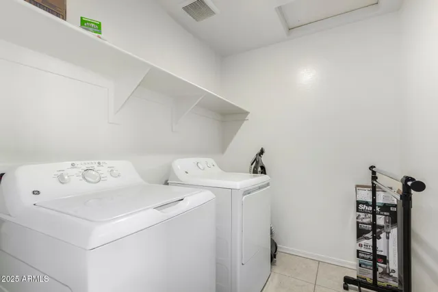 a bathroom with a bathtub and a toilet