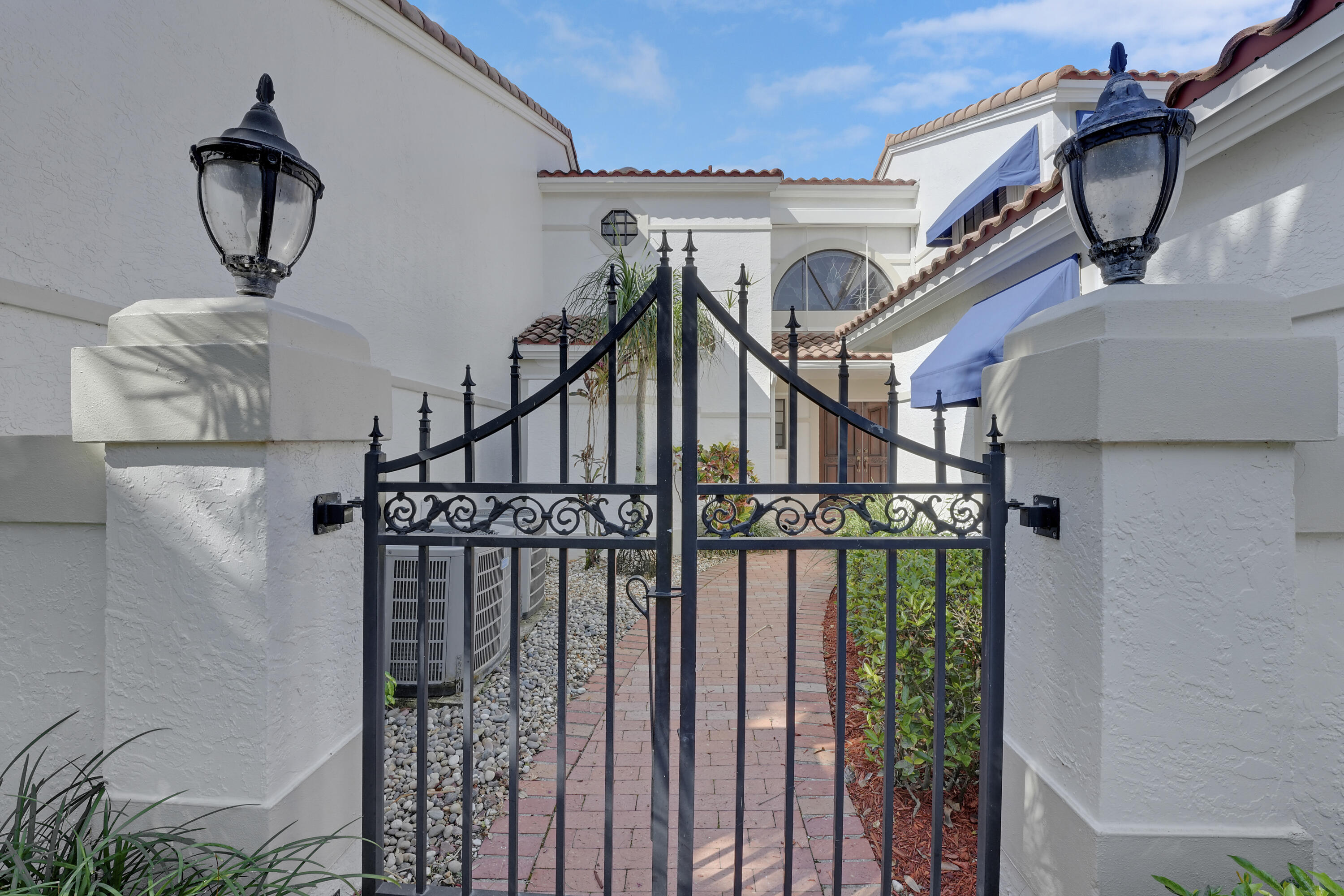 22508 Caravelle Circle, Unit 22508 Boca Raton, FL 33433 - Photo 4 of 46 Gate Entrance