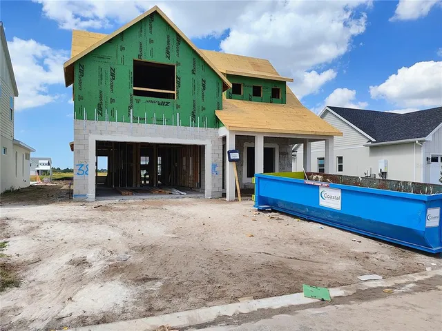 a view of a house with roof and a fireplace