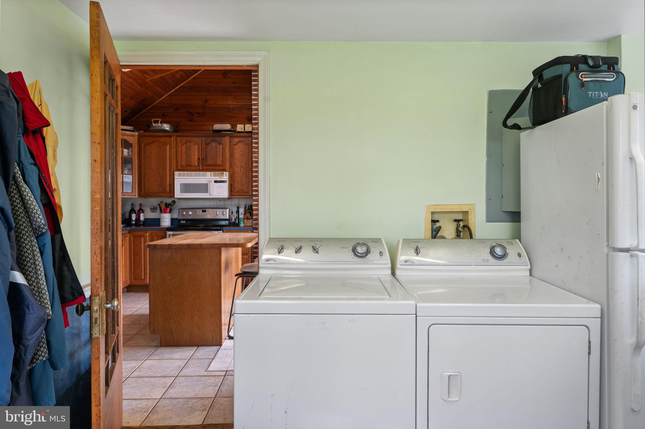420 Russell Road Berryville, VA 22611 - Photo 40 of 60 Bright laundry space with kitchen view.
