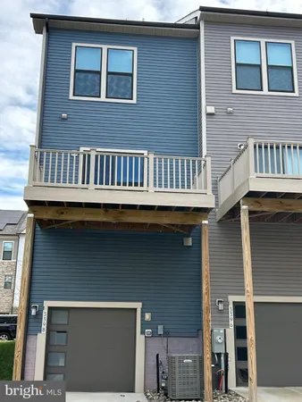 a view of a house with roof deck