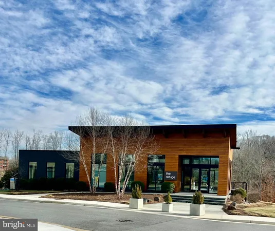 a view of a park with iron fence
