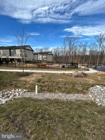 a view of a bathtub and a yard
