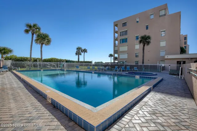 a bathroom with a sink and curtain