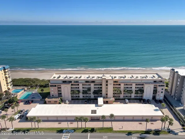 a view of a balcony with an ocean