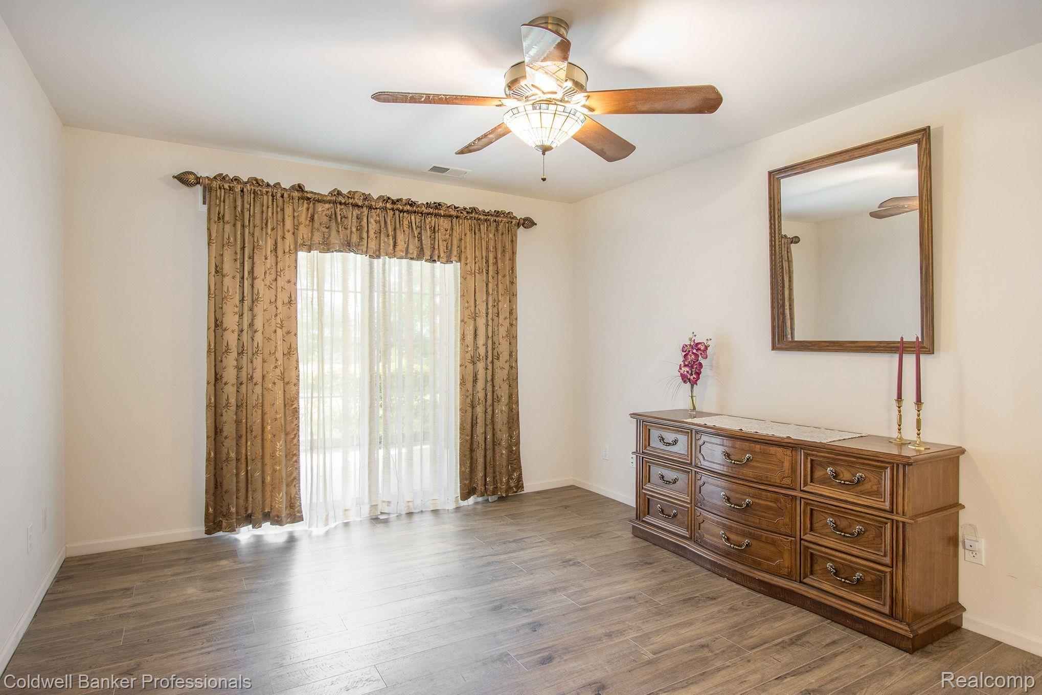 3388 Tremonte Circle, Unit 176 Rochester, MI 48306 - Photo 15 of 24 Master Bedroom