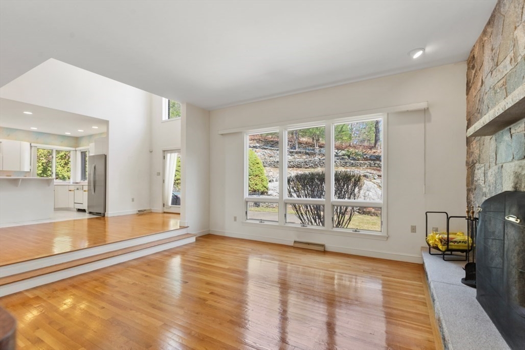49 Forest Street Saugus, MA 01906 - Photo 20 of 42 a view of an empty room with window and wooden floor