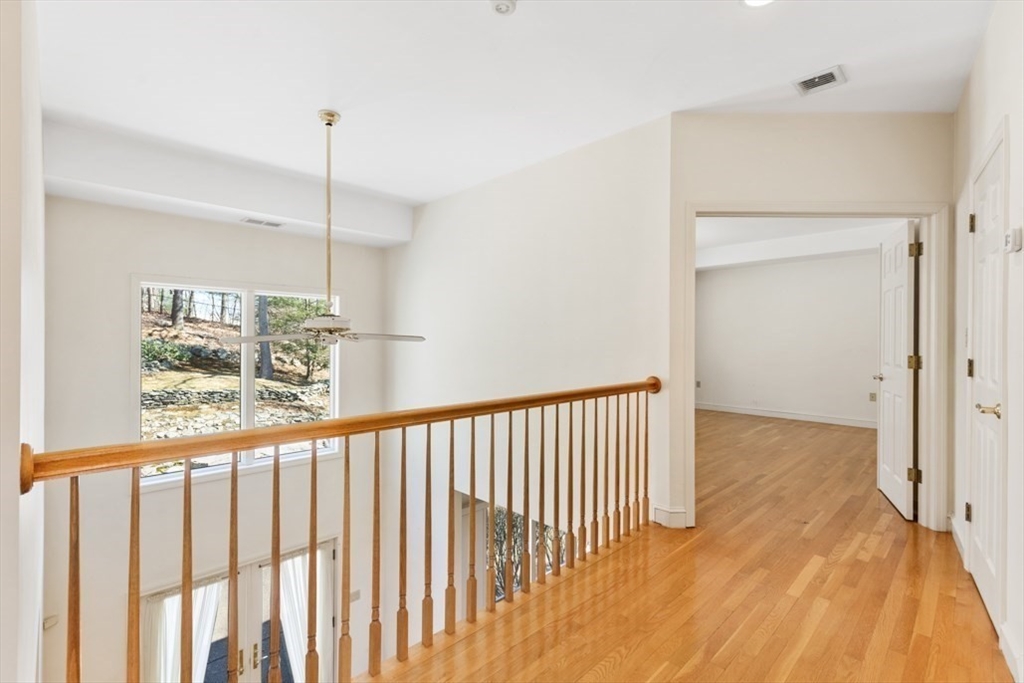 49 Forest Street Saugus, MA 01906 - Photo 27 of 42 a view of a hallway with window