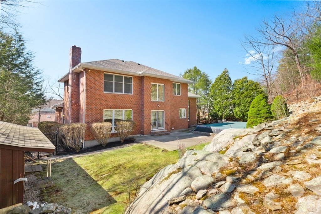 49 Forest Street Saugus, MA 01906 - Photo 36 of 42 a front view of a house with garden