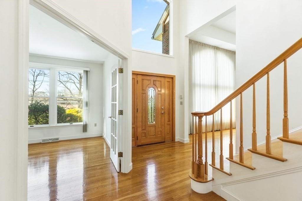 49 Forest Street Saugus, MA 01906 - Photo 5 of 42 a view of an entryway with wooden floor and door