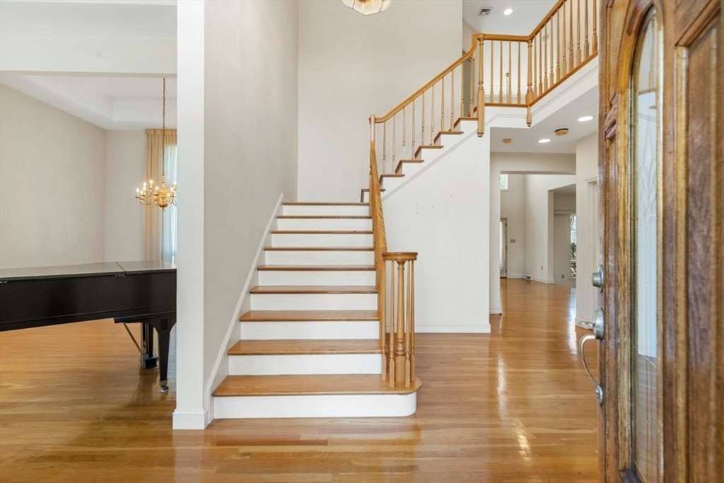 49 Forest Street Saugus, MA 01906 - Photo 6 of 42 a view of entryway and hall with wooden floor
