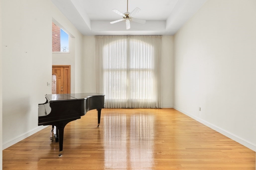 49 Forest Street Saugus, MA 01906 - Photo 7 of 42 a living room with a bed furniture and a window