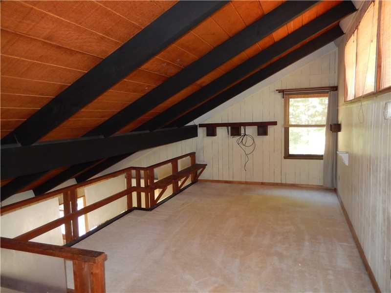 232 Sky Top Road Acme, PA 15610 - Photo 7 of 18 Family Room. Upper level loft area makes a great space for a family room or sitting area