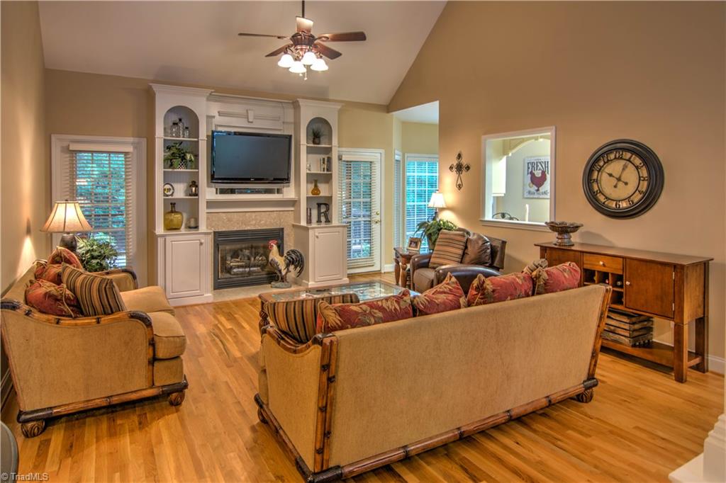 2494 Riverside Drive Lexington, NC 27292 - Photo 6 of 19 Great room with vaulted ceiling, hardwood flooring, open to foyer and dining